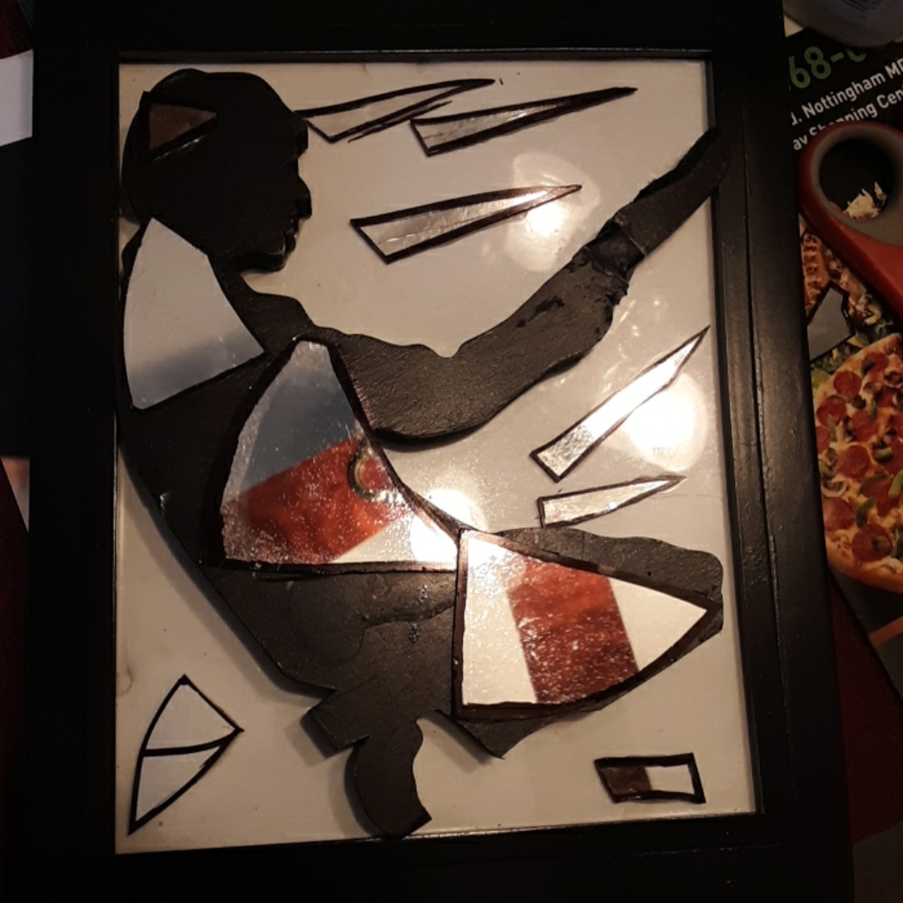 Artwork mirror frame can hang on wall or set on ta